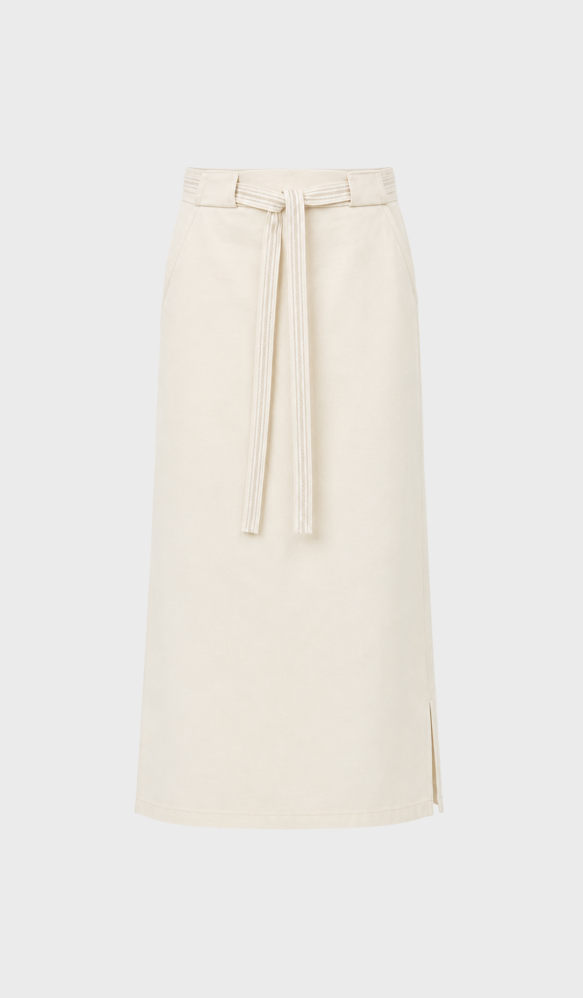 White skirt with a golden linen belt